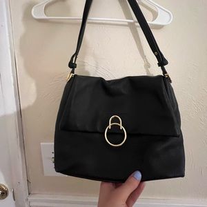 Vince Camuto bag with adjustable strap for either a purse or tote style